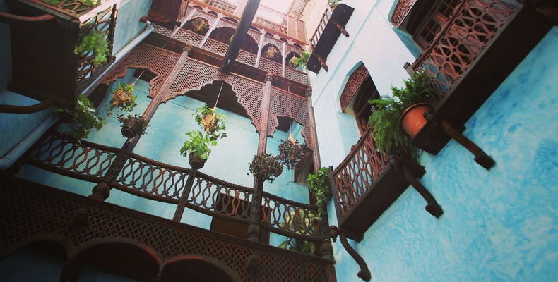Courtyard and carved balconies at Emerson Spice