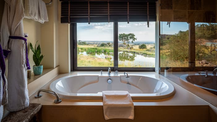 Bathroom with an outdoor outlook at Four Seasons Serengeti