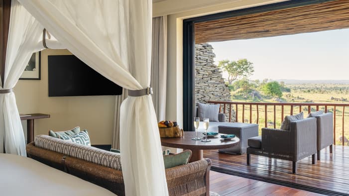 Bedroom and balcony at Four Seasons Serengeti