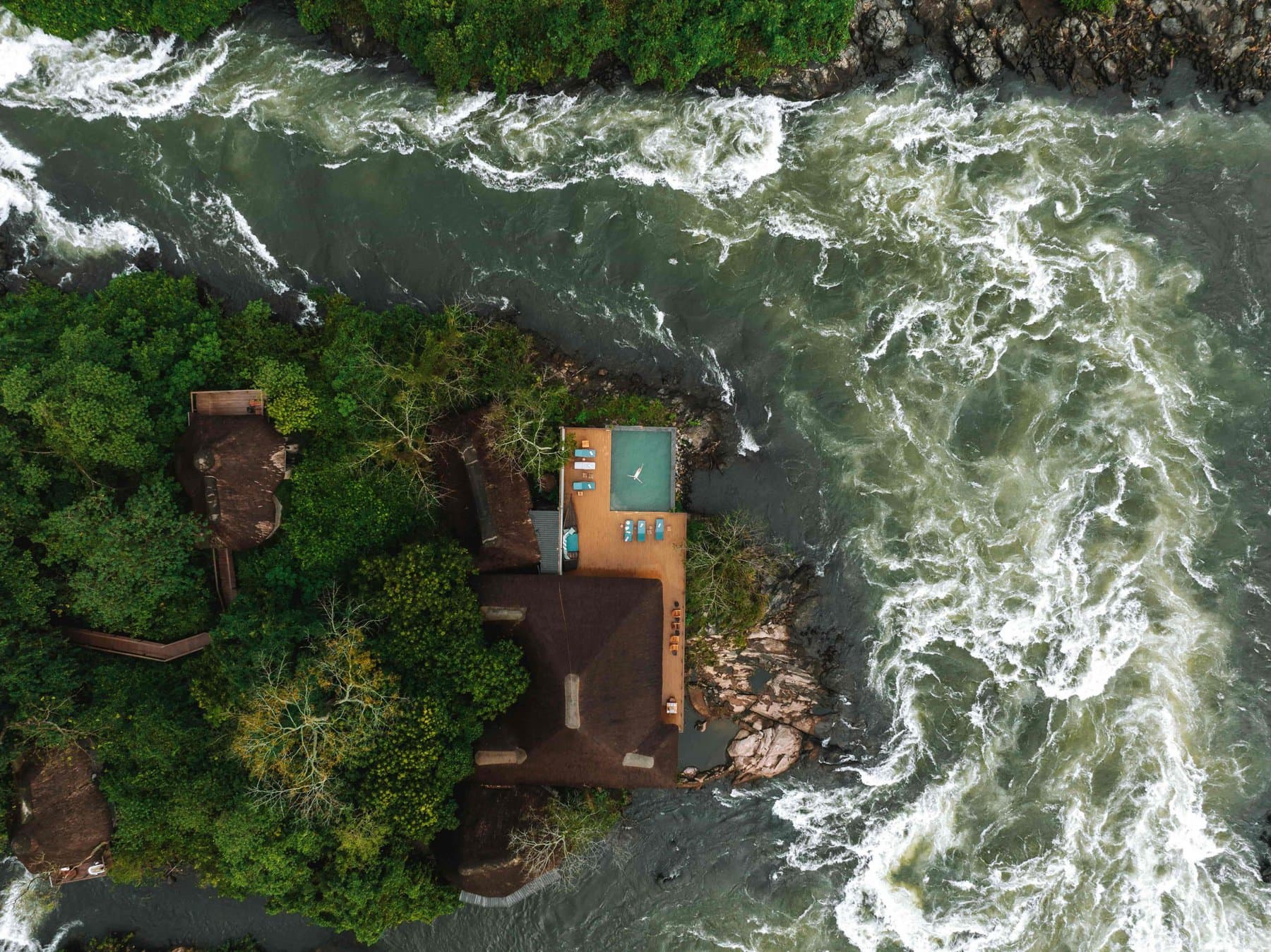 Aerial view of Lemala Wildwaters Lodge on a Nile island