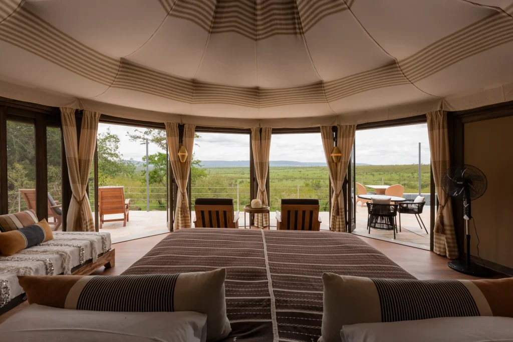 Tented room looking onto the conservancy at Hemingways Ol Seki Mara
