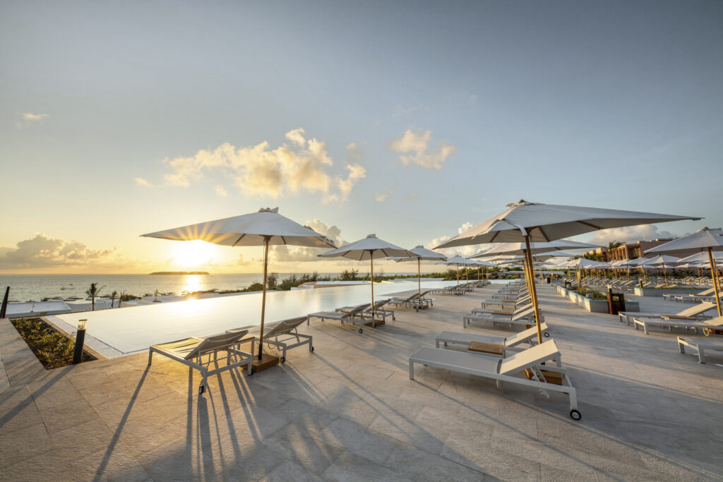 Pool terrace facing the sea at The Mora Zanzibar