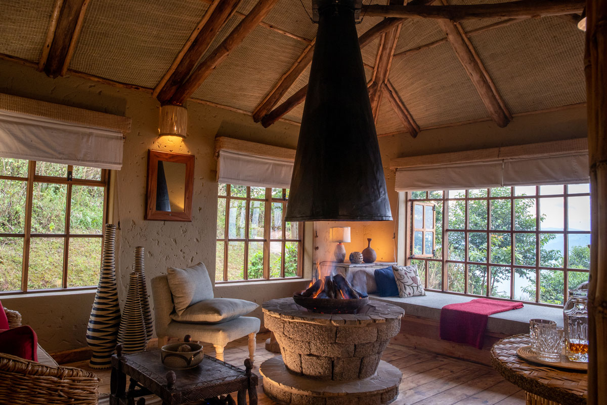 Guest room and fireplace at Virunga Lodge