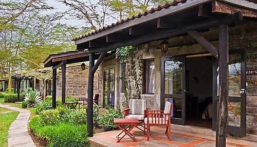 Exterior of one of the standard rooms, with private patio overlooking the lake. Sarova Lion Hill Game Lodge, Lake Nakuru National Park.