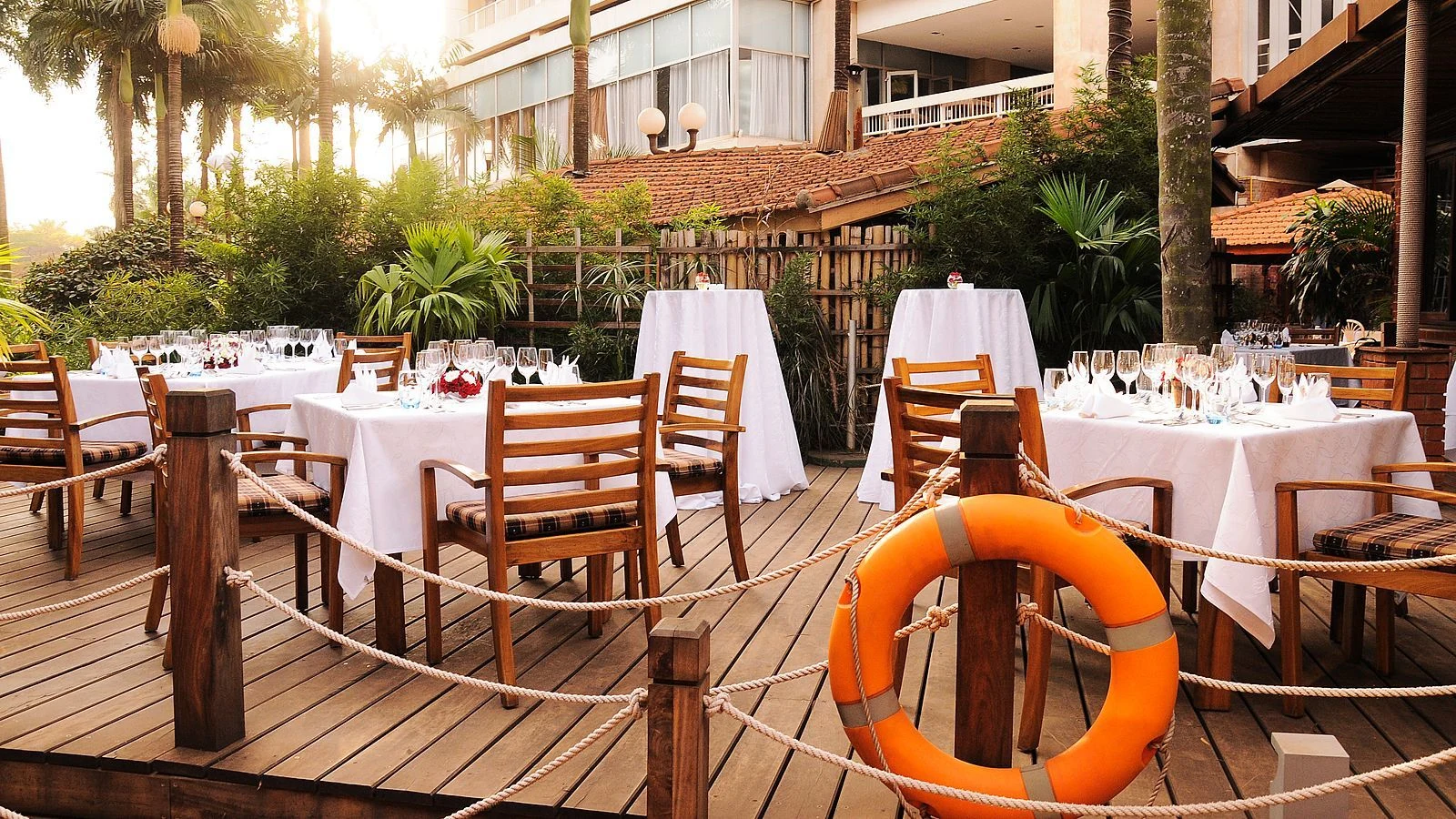 Outdoor restaurant deck beside the hotel at Sheraton Kampala Hotel