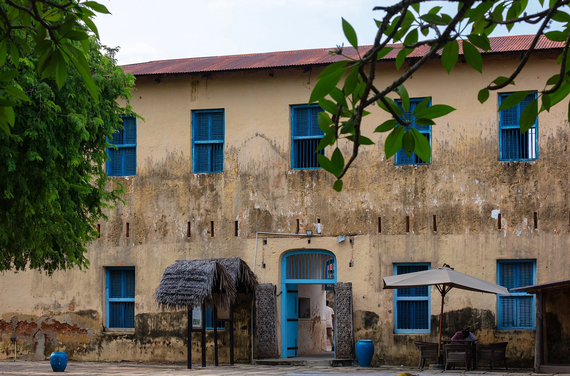 The old prison building on Changuu (Prison) Island with blue shutters