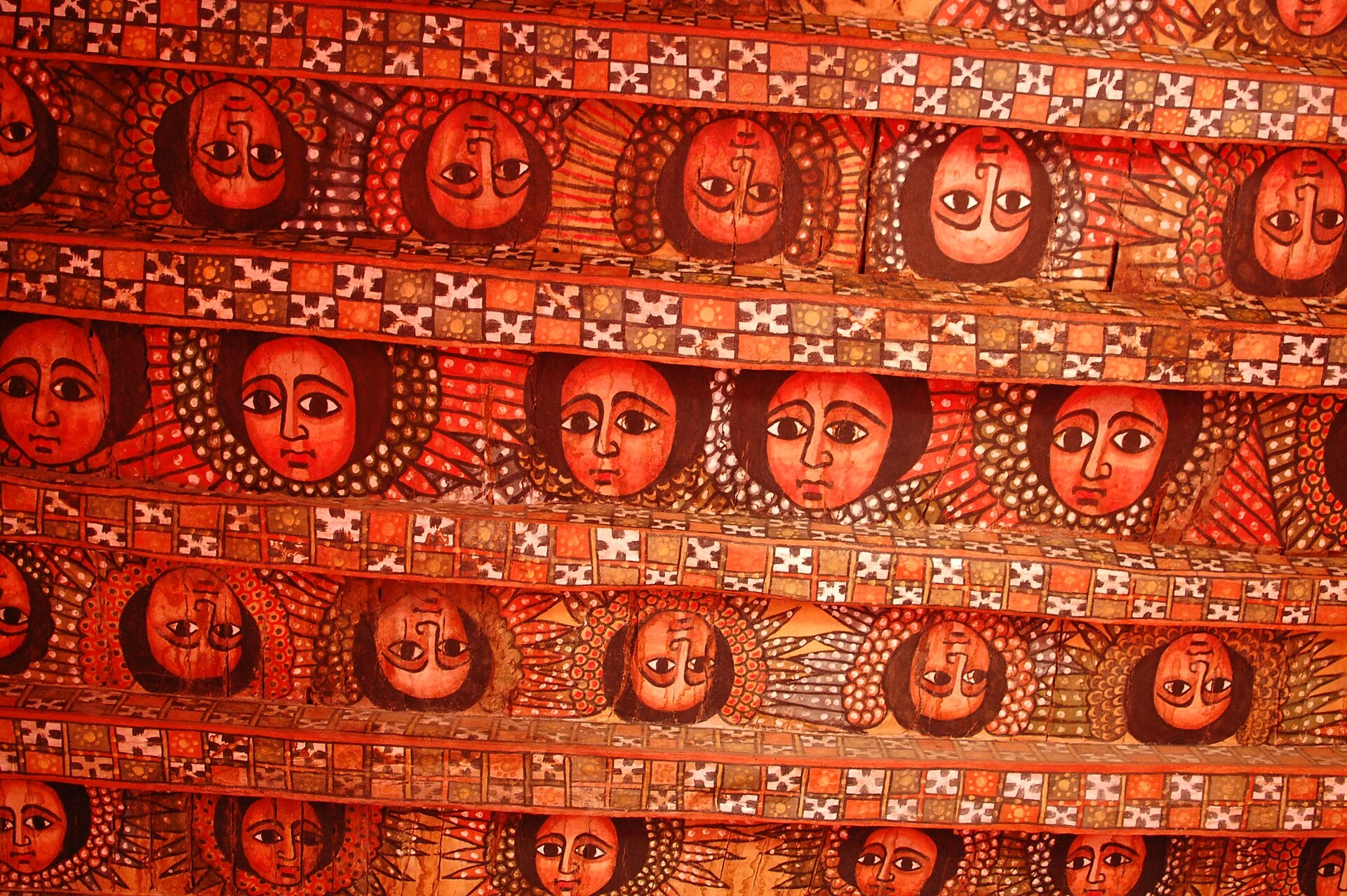 Rows of painted angel faces cover the ceiling of Debre Berhan Selassie church.
