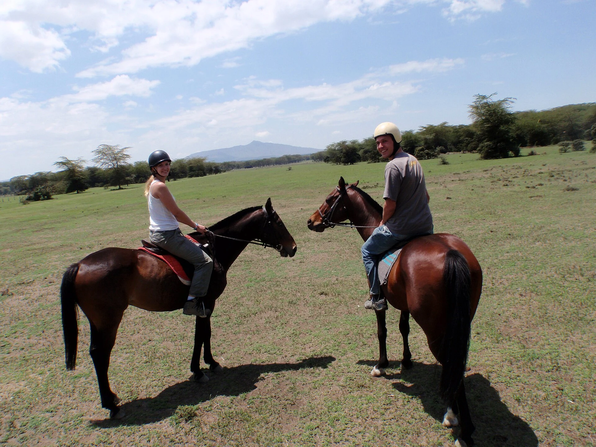 Two riders on a horseback safari in Kenya