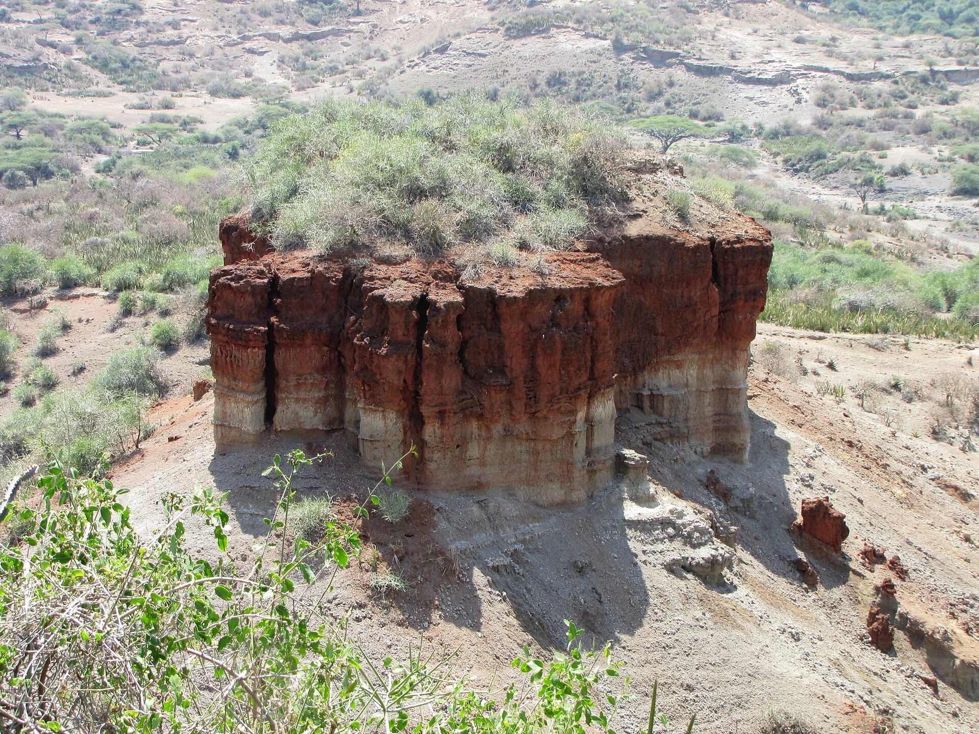 The eroded rock monolith standing in Olduvai Gorge