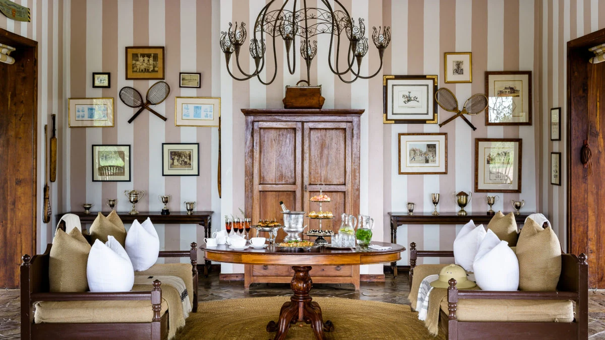 Lounge with framed pictures and chandelier