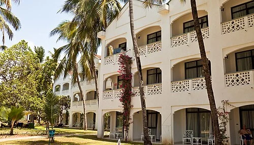 Palm Rooms located in blocks around the picturesque Palms pool. Sarova Whitesands Beach Resort, Mombasa.