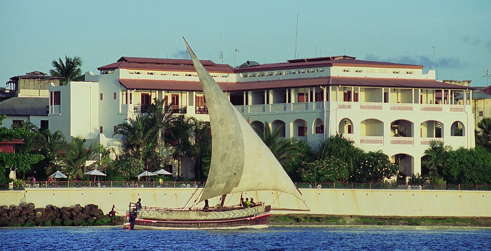 A dhow sailing past the Zanzibar Serena hotel on the Stone Town seafront