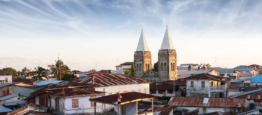 The twin spires of St Joseph's Cathedral above the rooftops of Stone Town