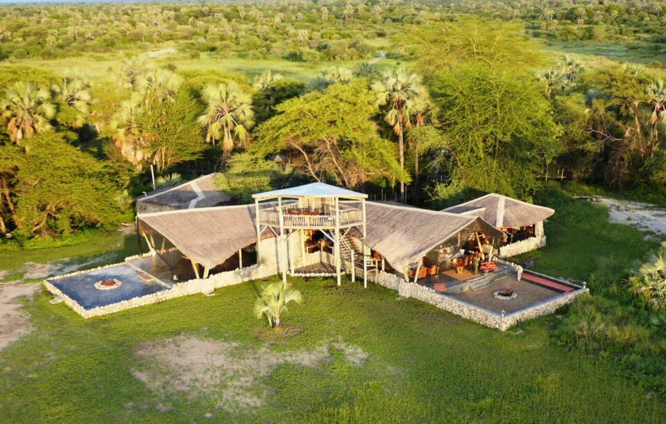 Aerial view of lodge among palms at Chem Chem Lodge