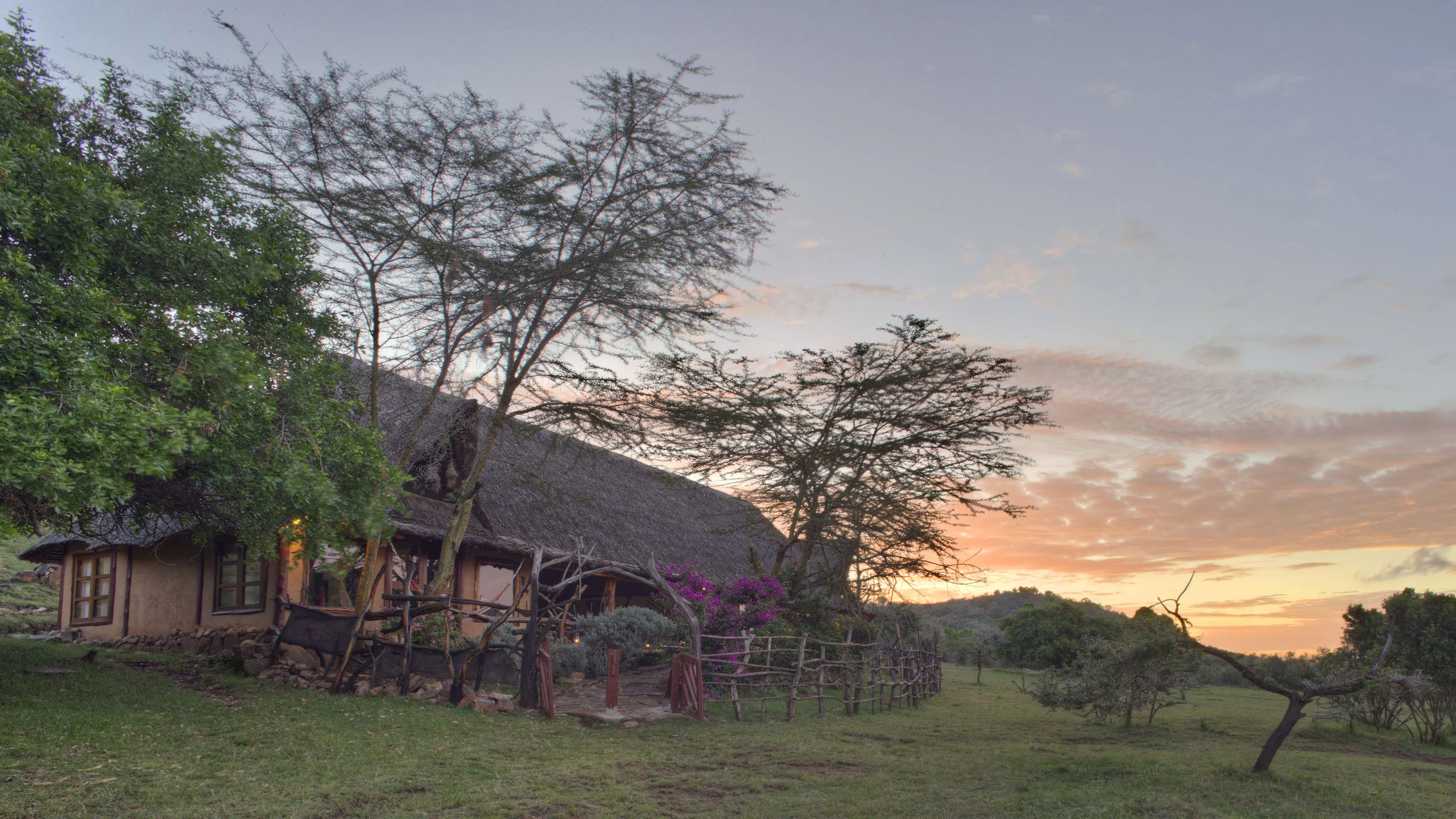 Wooden lodge at sunset at Saruni Mara