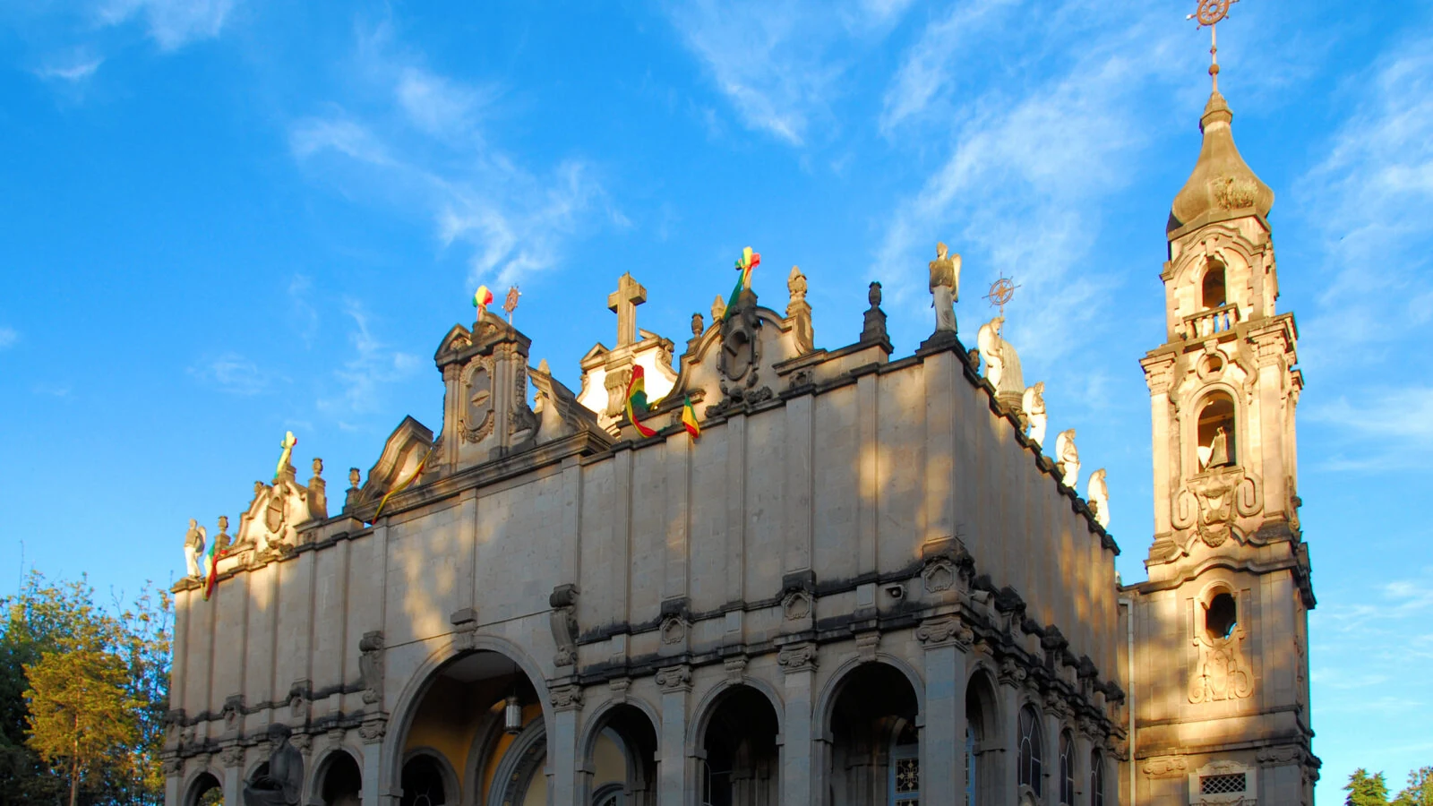 Holy Trinity Cathedral with bell tower under blue sky