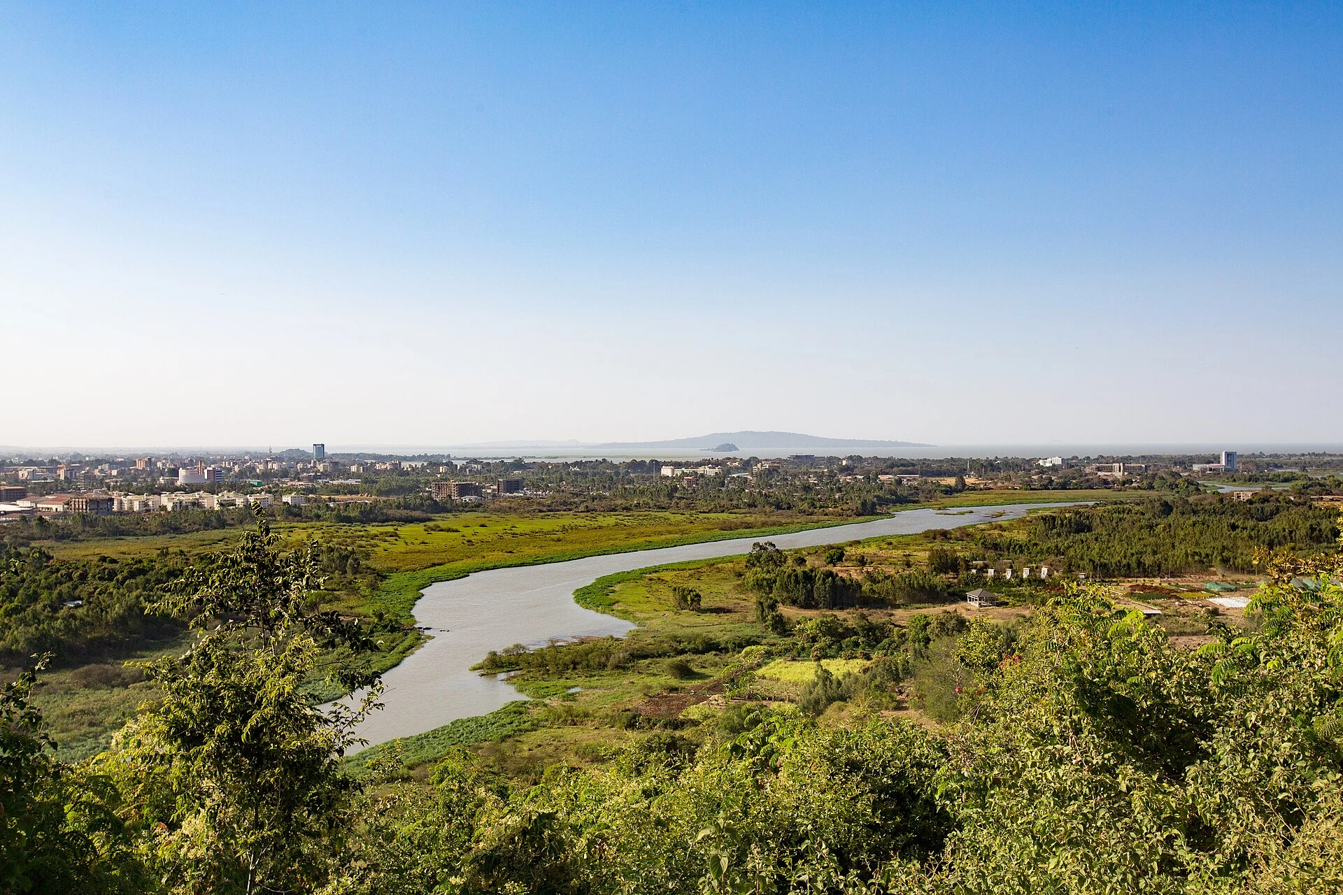 The Blue Nile winds through green marshland near Bahir Dar.