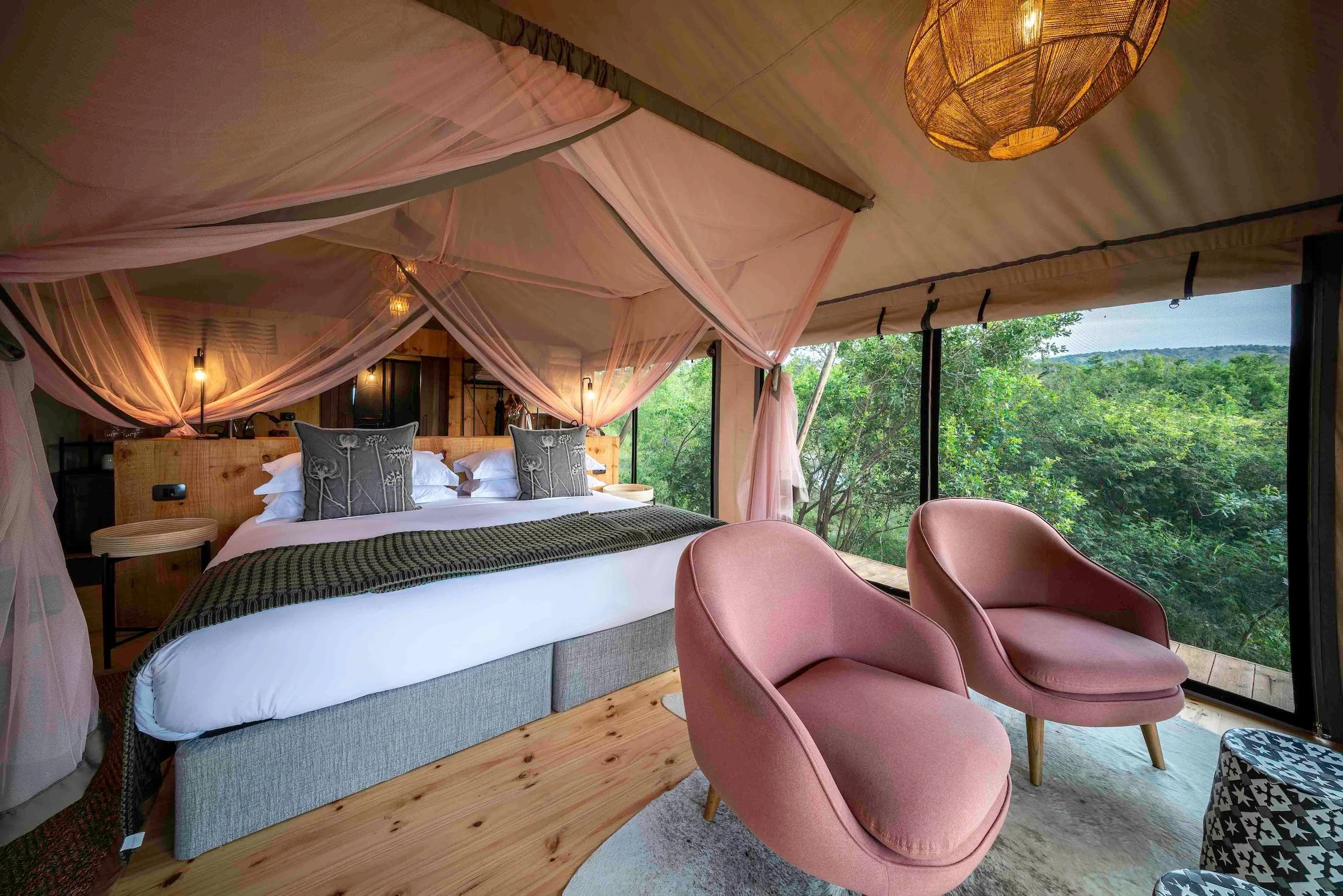 Canvas bedroom with pink chairs
