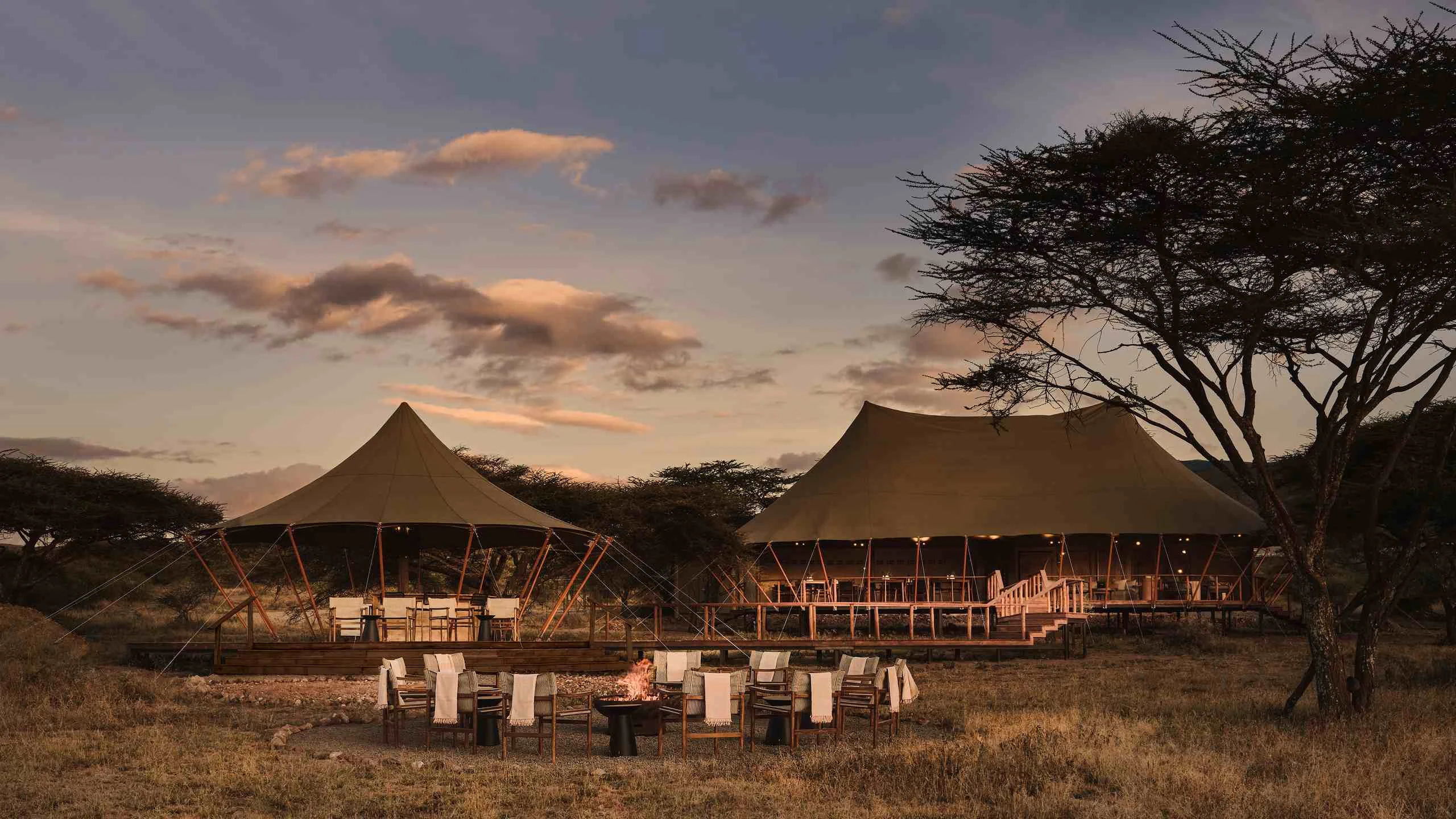 Canvas lodges at dusk at Sanctuary Ngorongoro Crater Camp