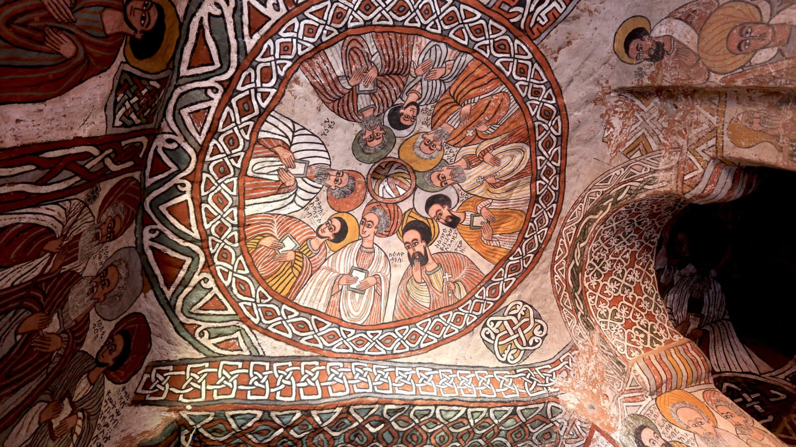 A painted circular fresco on the ceiling of a Tigray rock-hewn church.