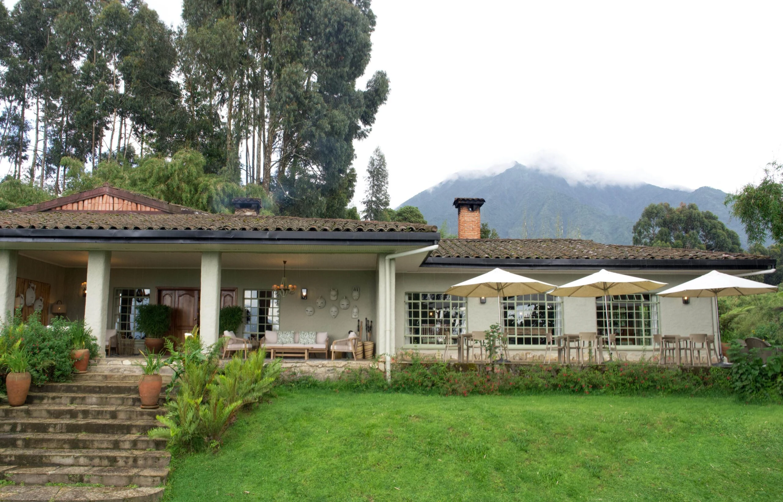 Low lodge building across green lawns