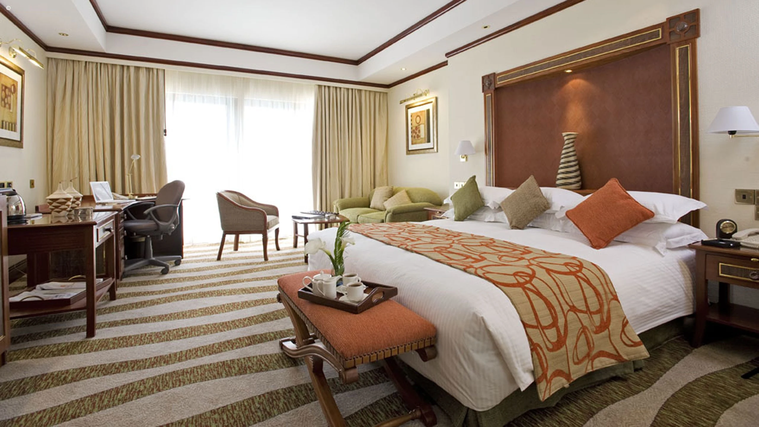 Bedroom with patterned blanket