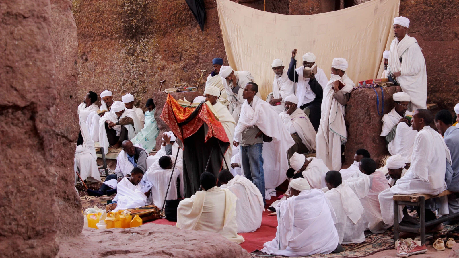 White-robed worshippers gather for a service in a Lalibela rock-hewn church.