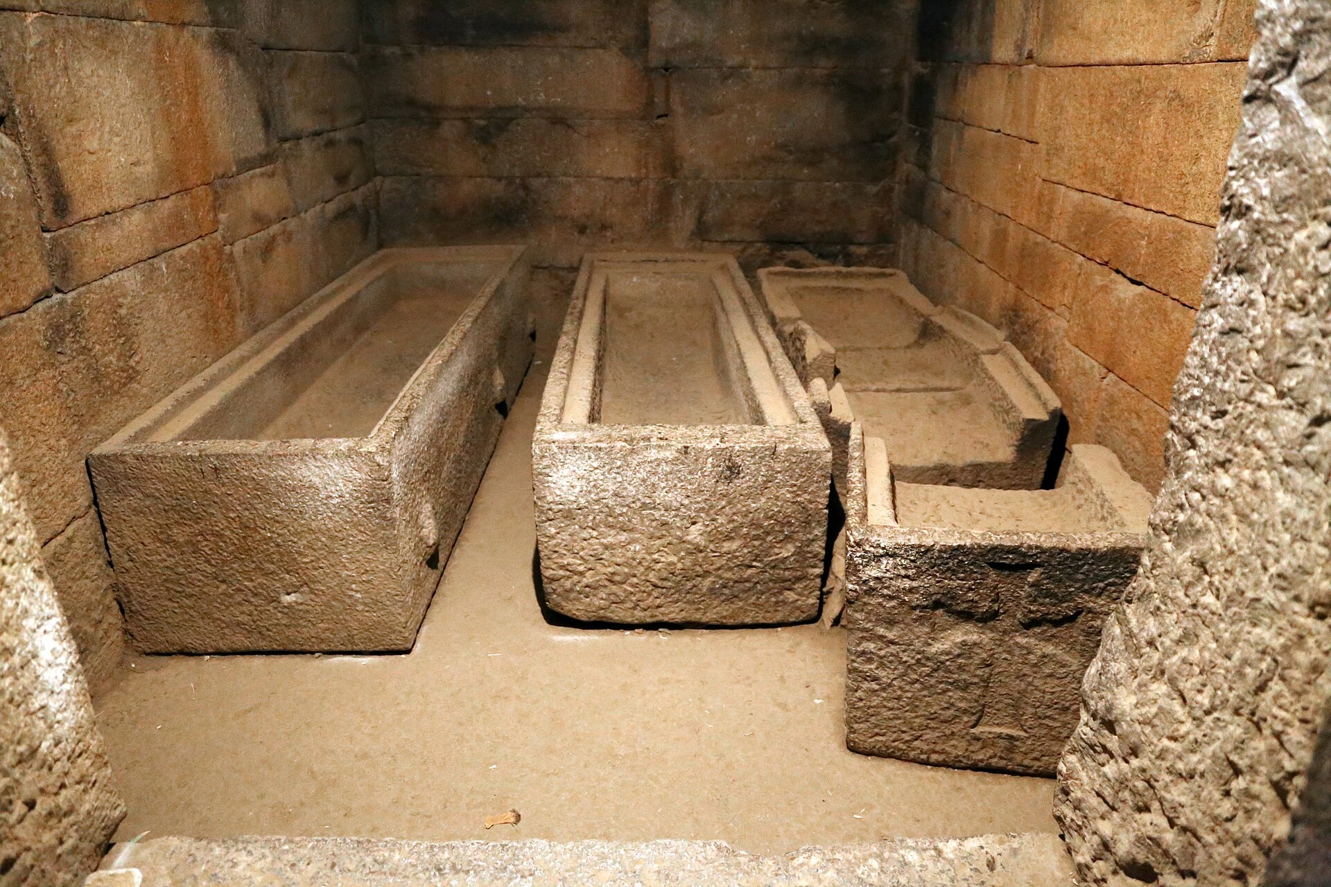Stone sarcophagi in an underground chamber of the tombs of Kaleb and Gebre Meskel.