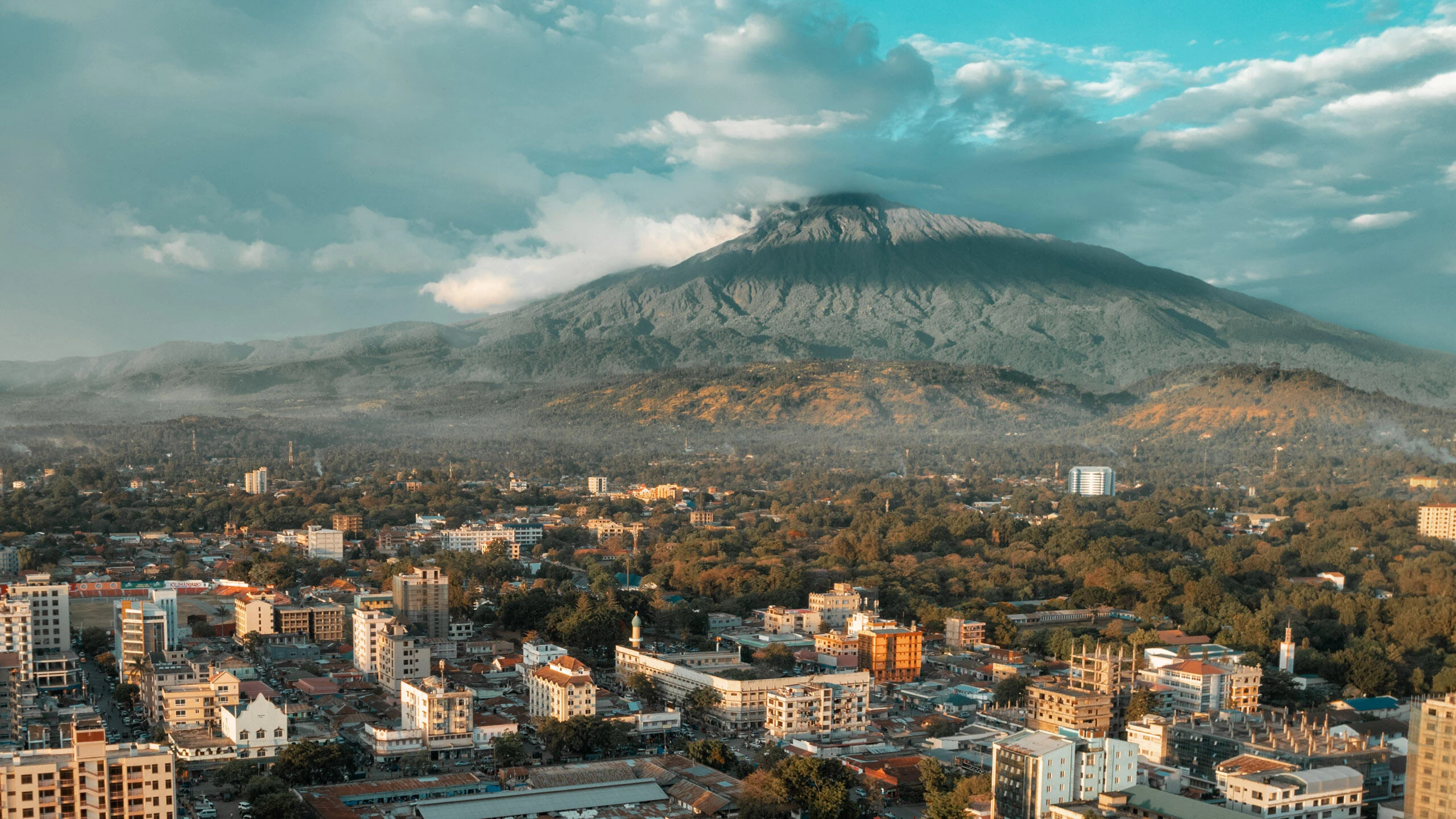 Aerial of Arusha city with Mount Meru behind