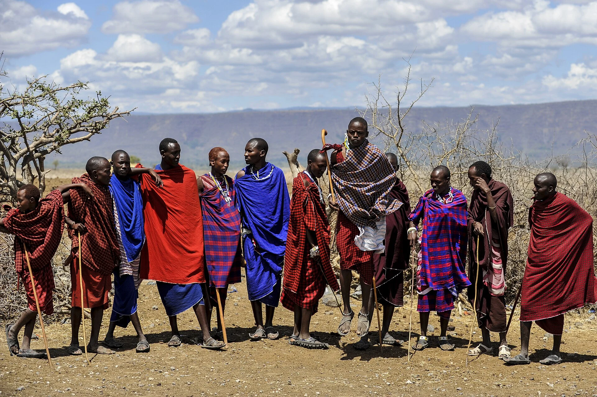 Maasai men performing a traditional jumping dance in their village