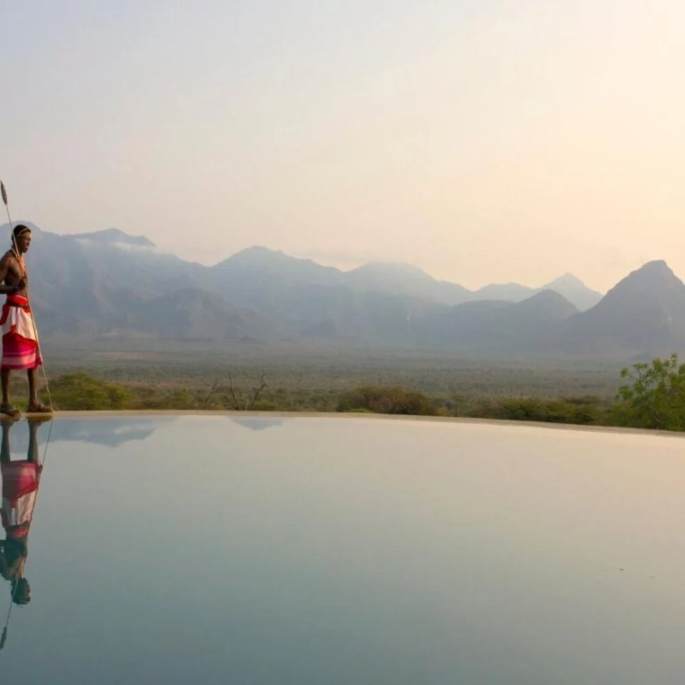 Infinity pool with mountain backdrop