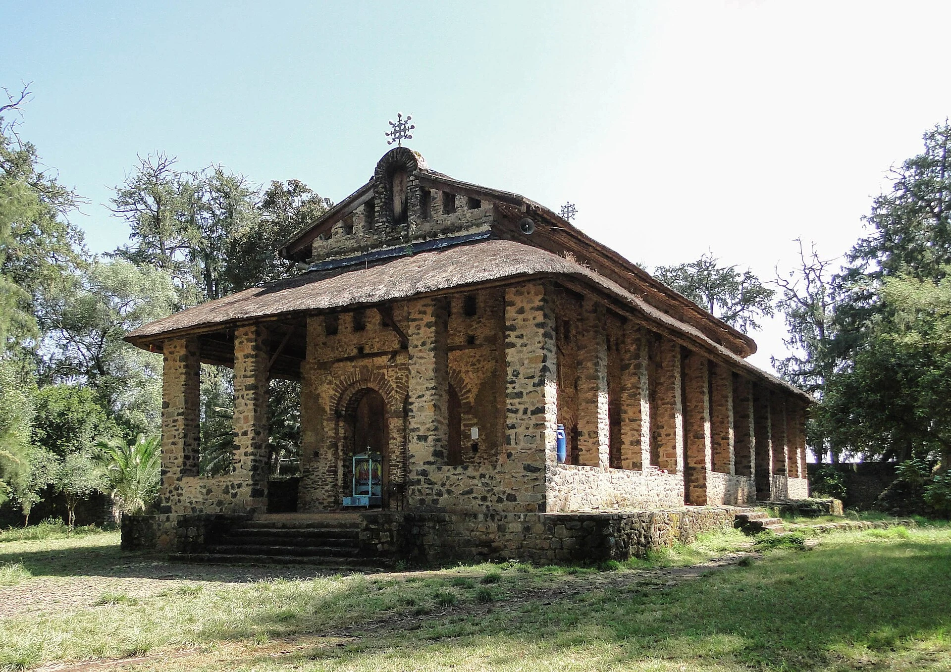 The stone walls and thatched roof of Debre Berhan Selassie church in Gondar.