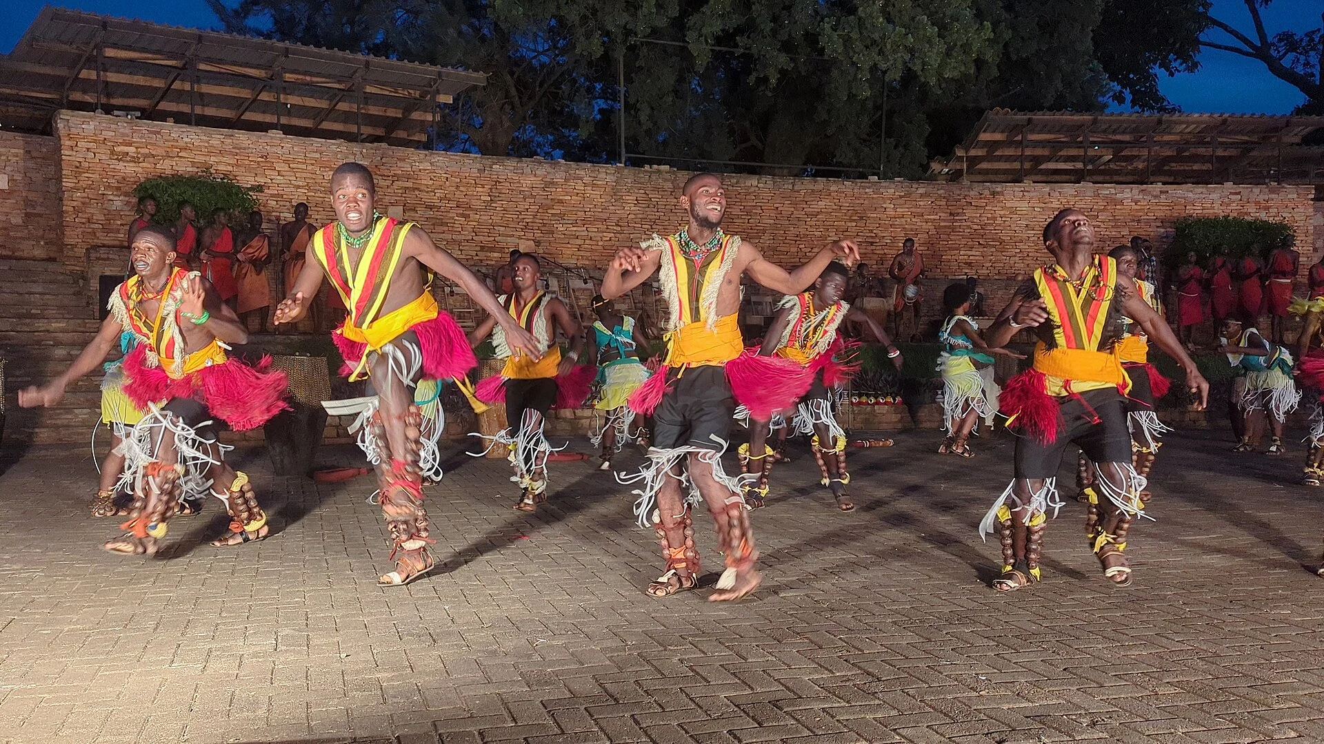 Dancers in bright costumes performing at the Ndere Cultural Centre in Kampala