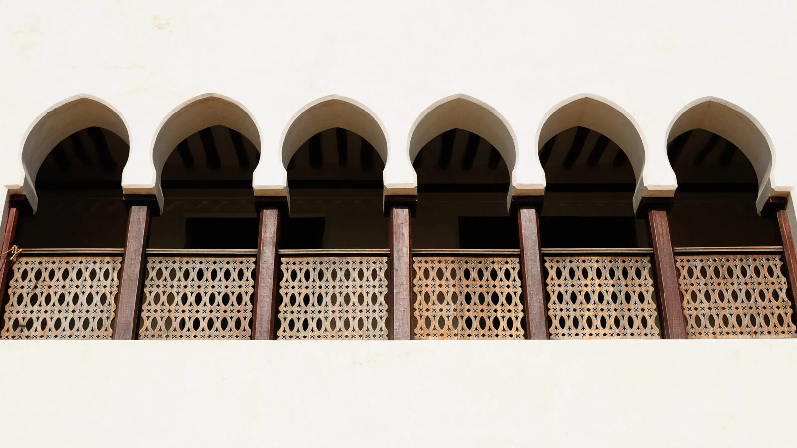 A row of carved Swahili arches in the Lamu archipelago