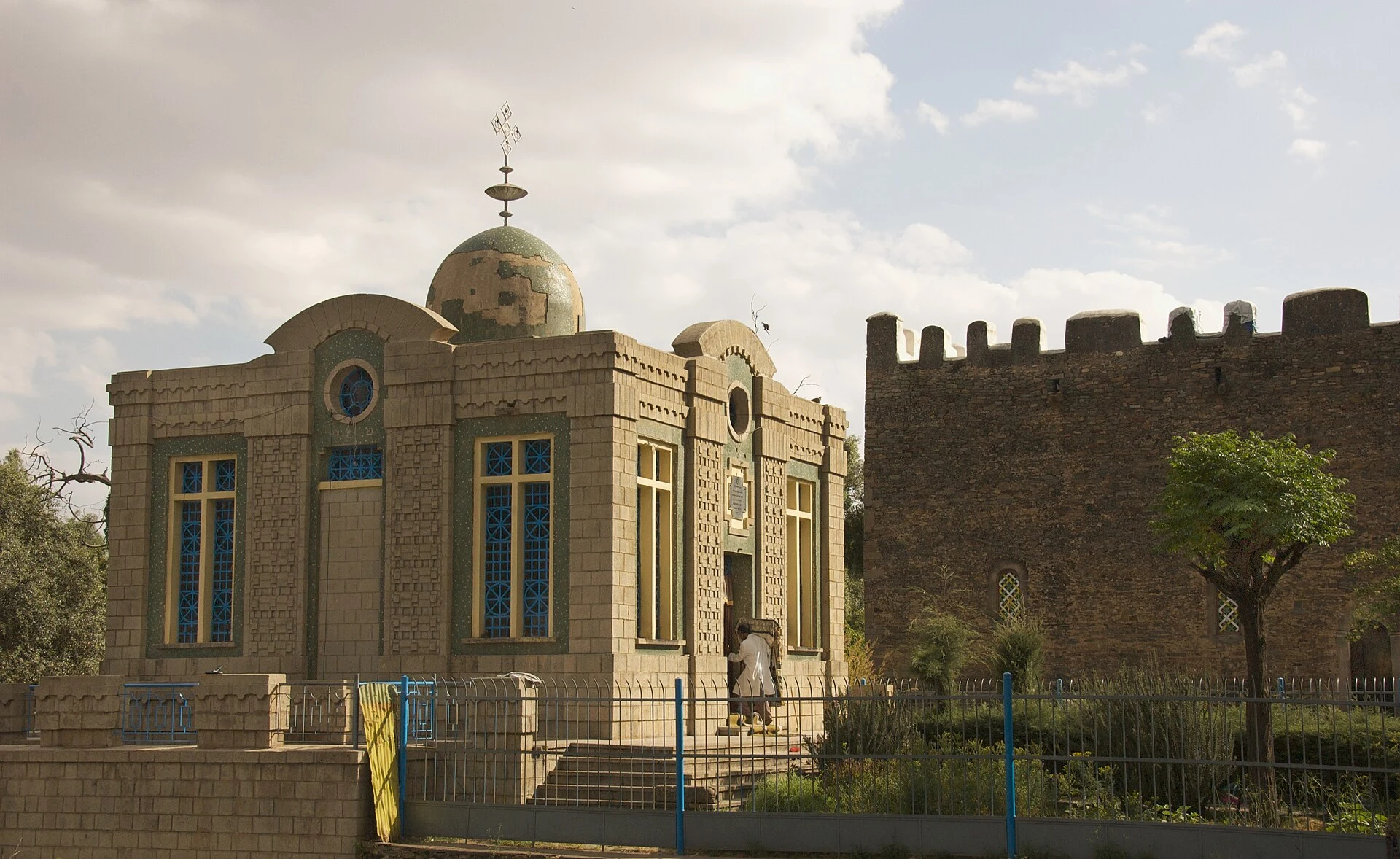 The domed Chapel of the Tablet beside the old church walls in Axum.
