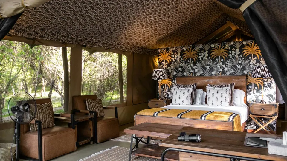 Lerai tent bedroom with botanical interior