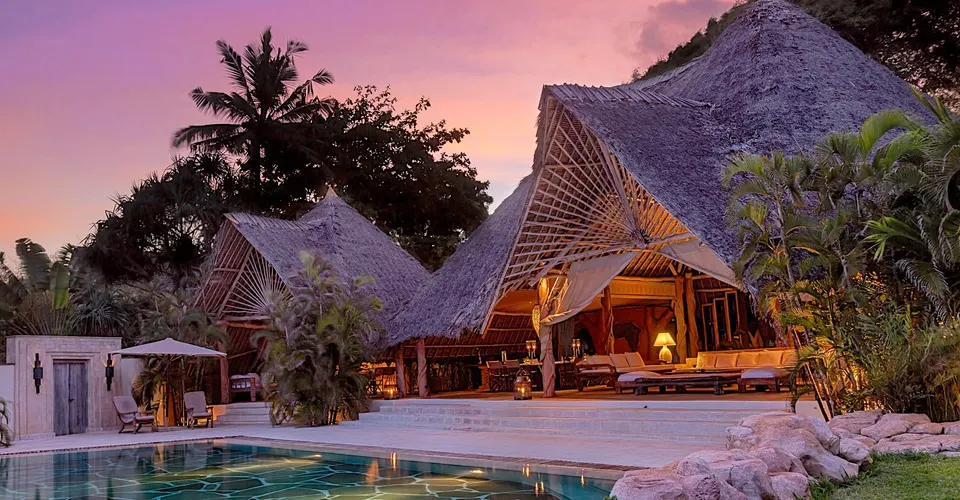 Alfajiri Garden Villa and pool at dusk
