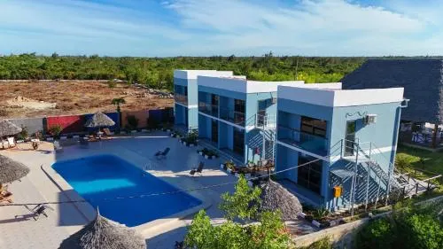 Wayma resort buildings and swimming pool from above