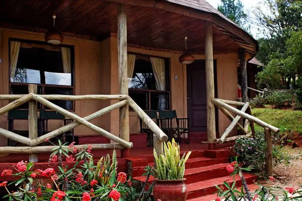 Masai Mara Sopa Lodge cottage veranda and garden