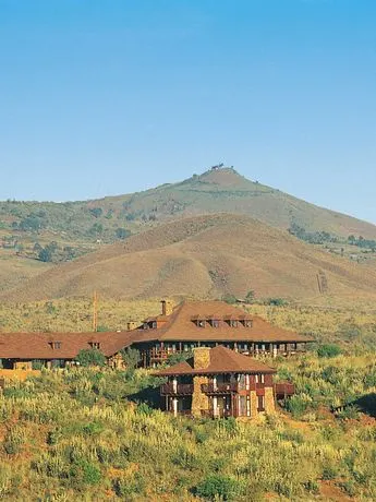 Great Rift Valley lodge buildings and hillside setting