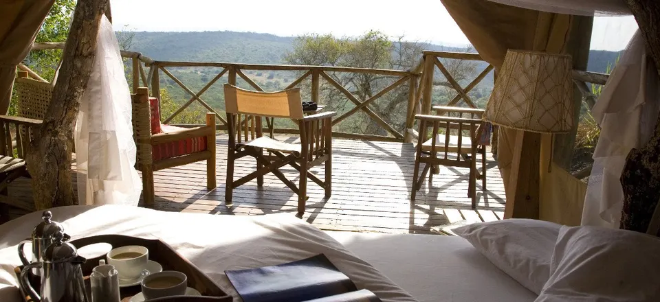 Tented bed and private deck view