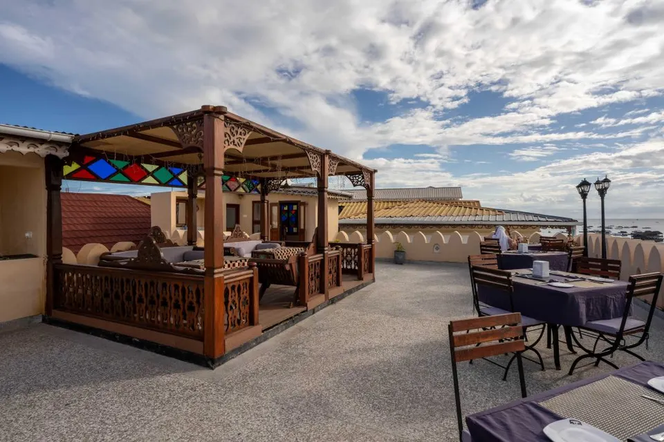 Seafront terrace and dining setting