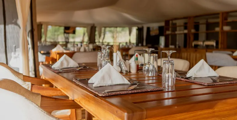 Dining tables in the Enkirari mess tent