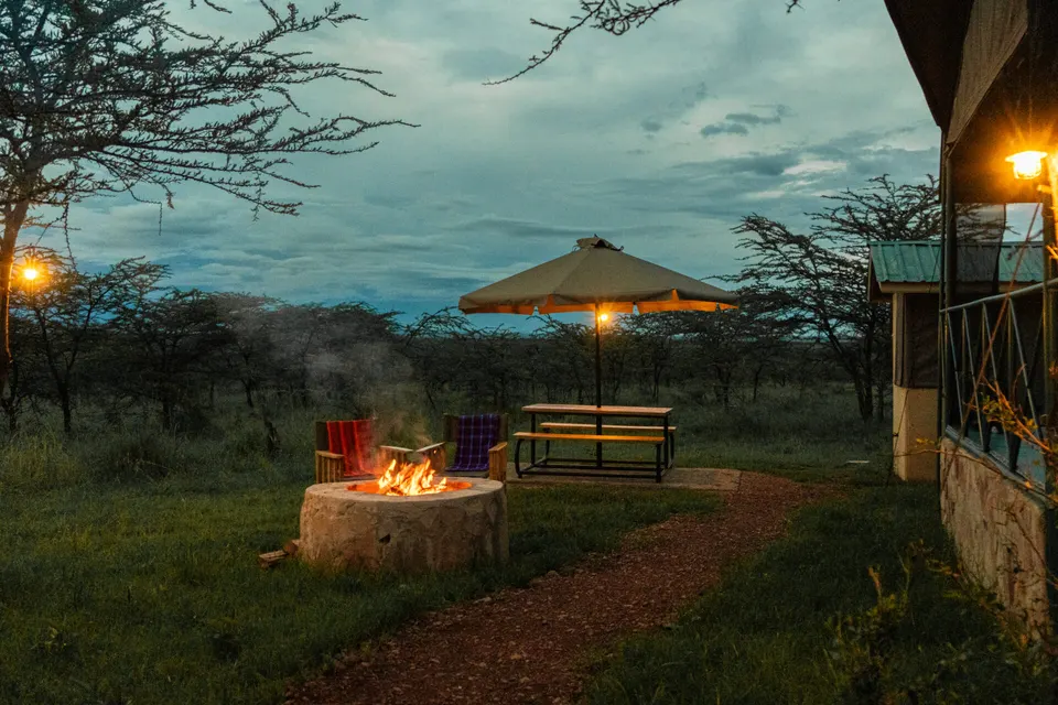 Kobe Mara fire-pit seating at dusk