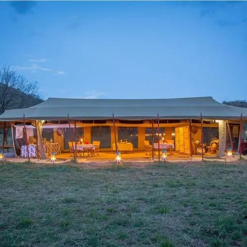 Main camp tent at dusk