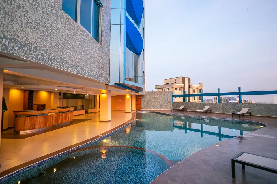 Parrot Hotel pool deck and bar beside the main building