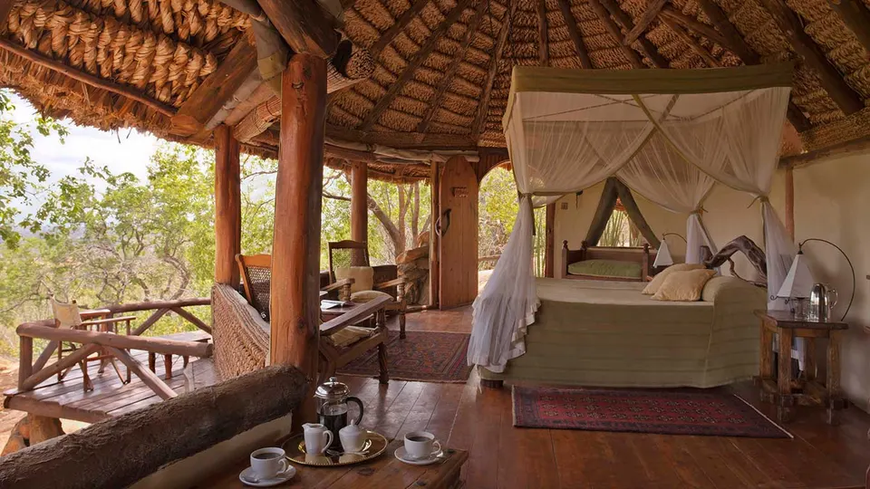 Cottage bedroom and open veranda