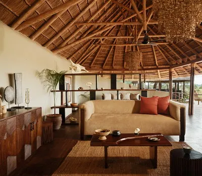 Swala lounge beneath a high thatched roof