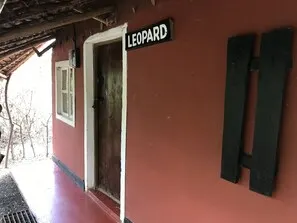 Maasai Simba Camp cottage exterior marked Leopard