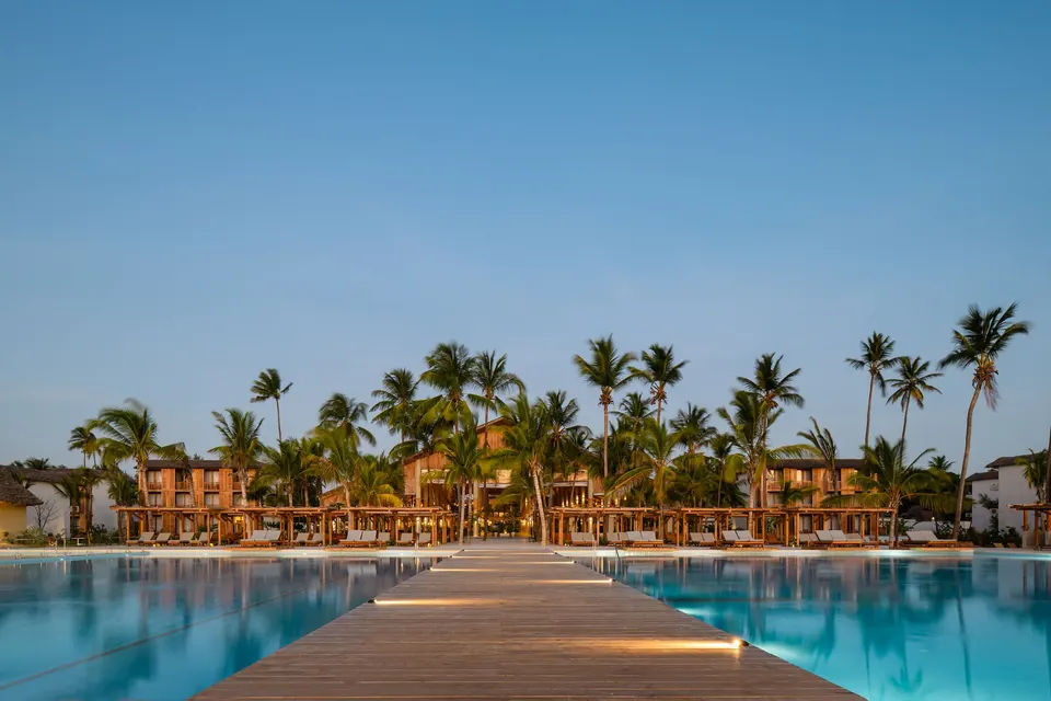 Main pool and resort architecture at dusk